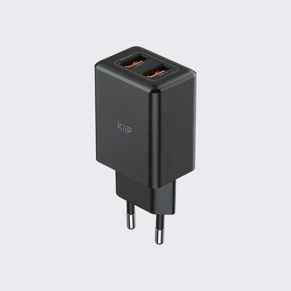 A black Qi wireless charging adapter with two USB-C ports, featuring the KiiP logo on the side, shown on a light gray background.