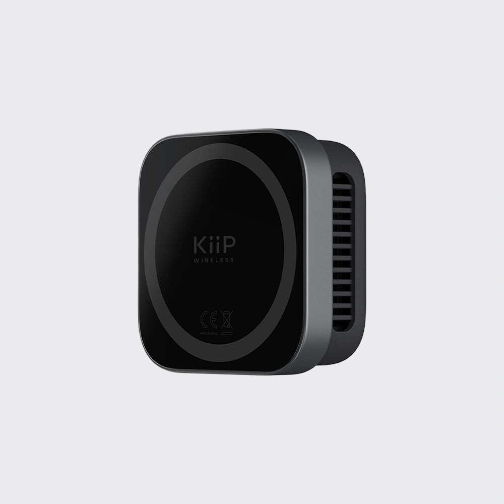 Black wireless charging pad with 'KiiP' branding on a light gray background
