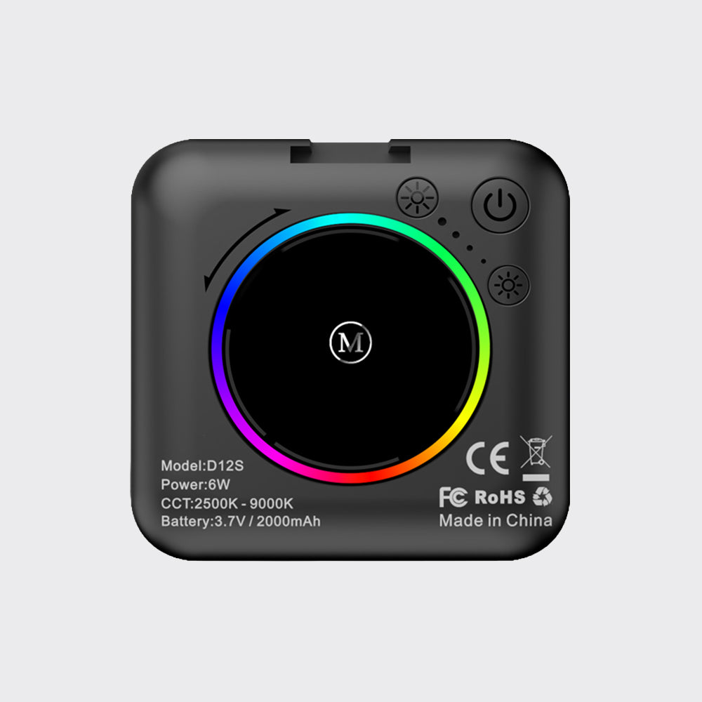 A black square electronic controller with rounded corners, featuring a large circular display with a multicolor RGB ring, power and fan icons, and technical specifications printed on the front.