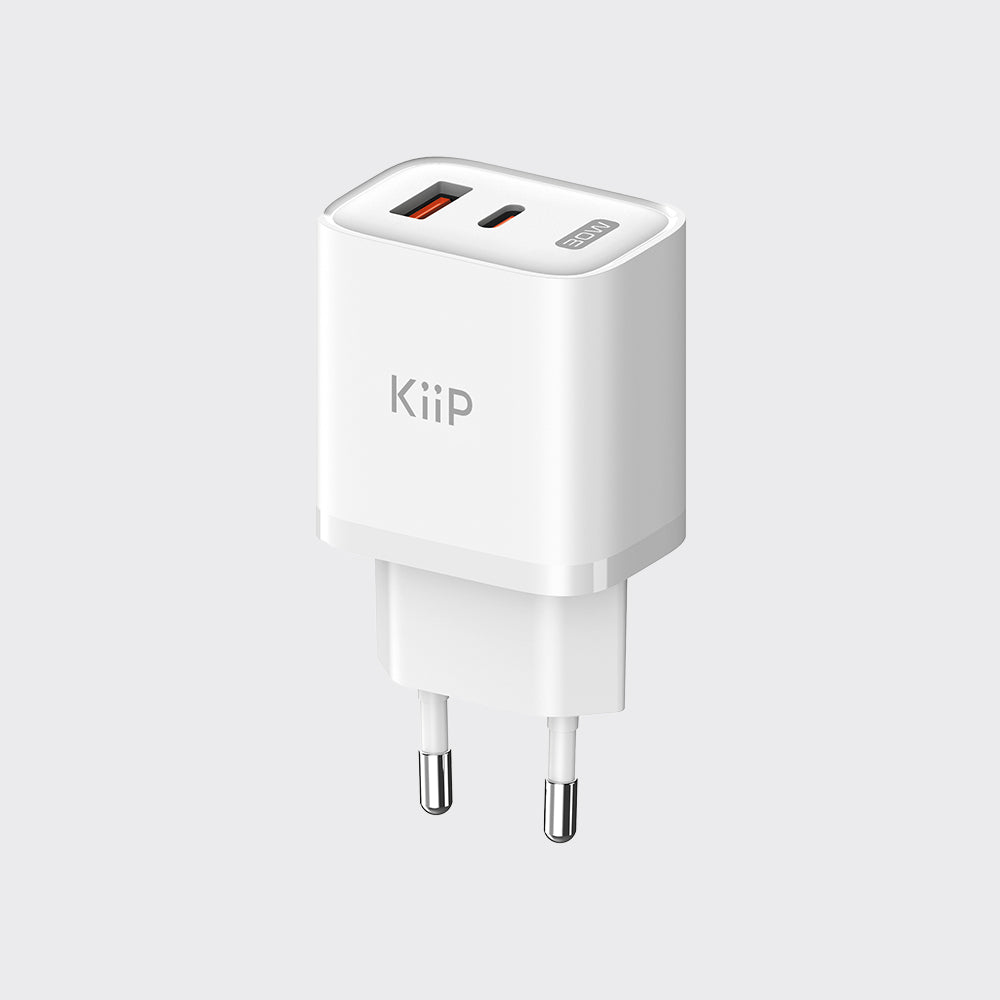 A white KiiP USB-C wall charger with a European two-pin plug, shown on a light gray background.