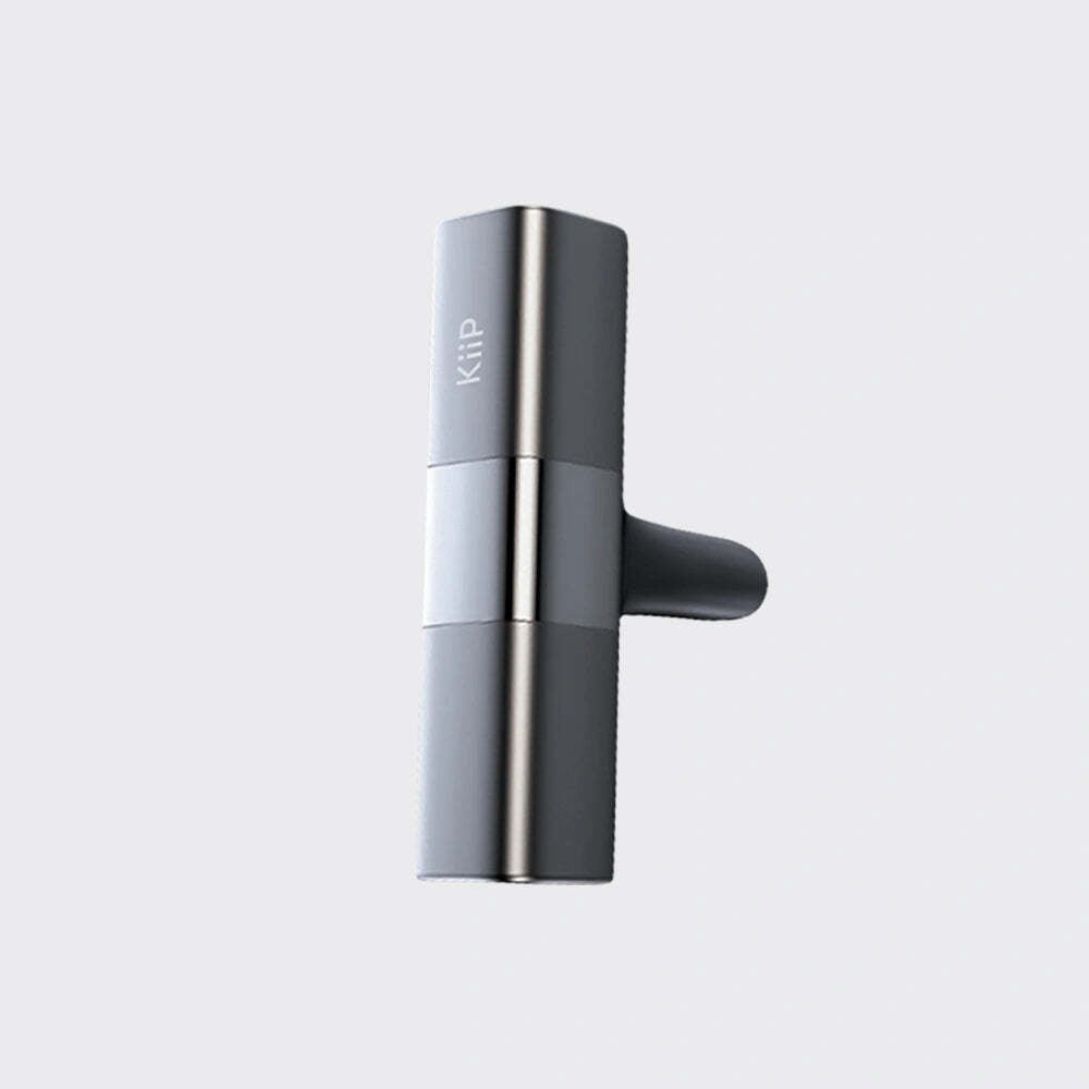 Gray and silver cleaning tool with 'Kiip' branding on a light gray background