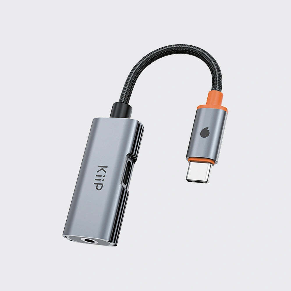 Kiip USB-C to 3.5mm adapter on a light gray background