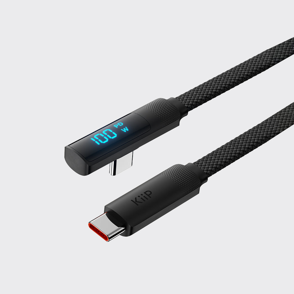 A black braided USB-C charging cable with a digital LED power display showing 100W on one end and a USB-C connector on the other, set against a light gray background.