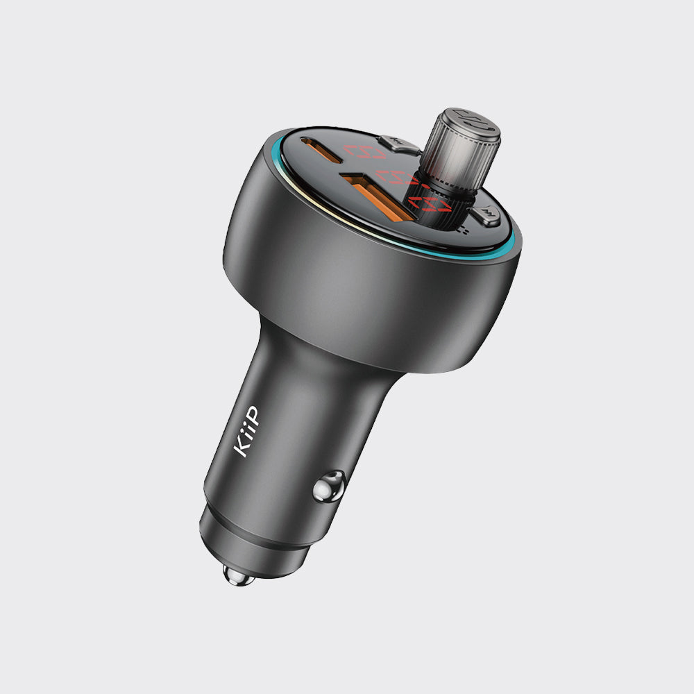 A KiiP brand car cigarette lighter adapter with a built-in wireless charging coil and a transparent cylindrical antenna, shown on a light gray background.