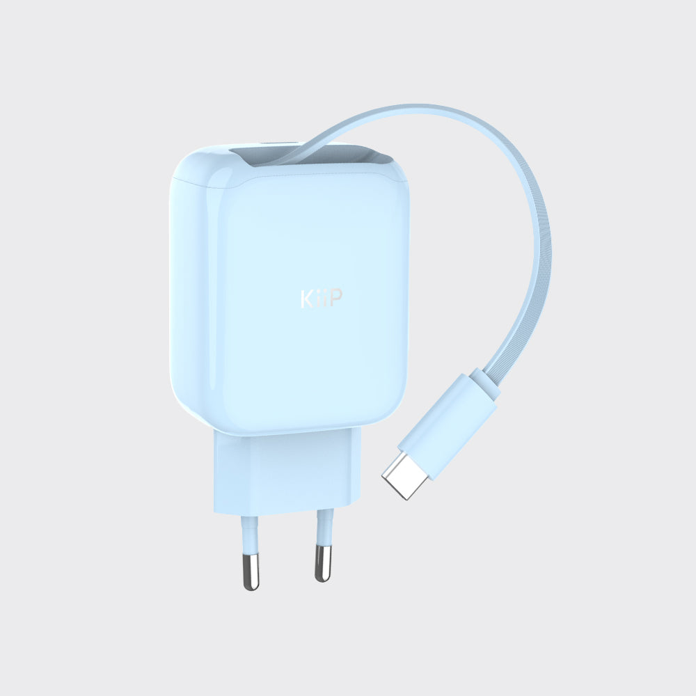 A light blue KCP USB-C wall charger with a two-pin European plug and a matching USB-C cable, shown on a light gray background.